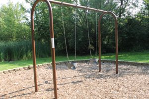 Photo of the Hollydale Park swings.