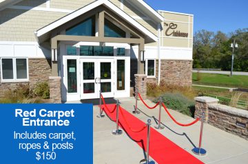 Photo of Red Carpet Entrance that reads, 