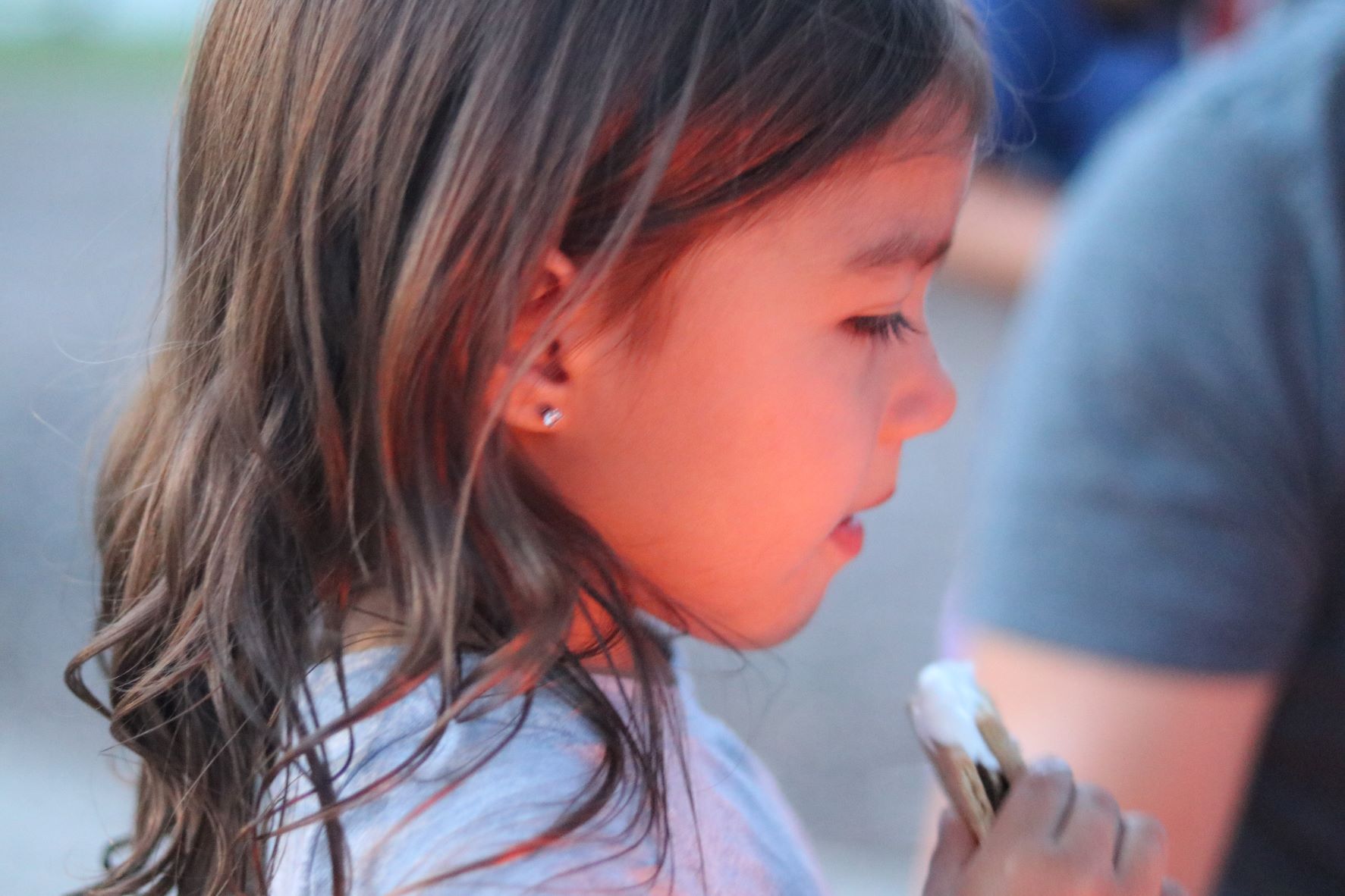 photo of child at the community bonfire