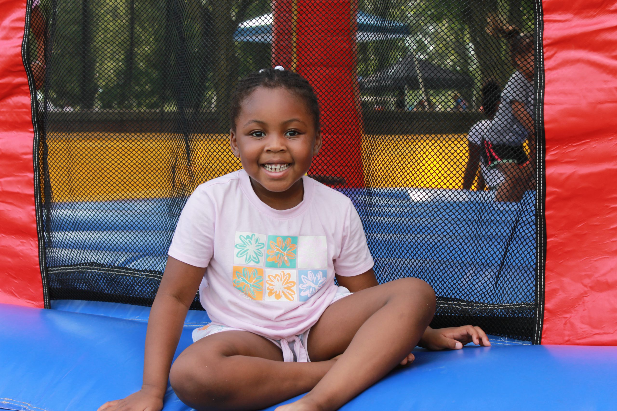 Photo of child in a bounce house.