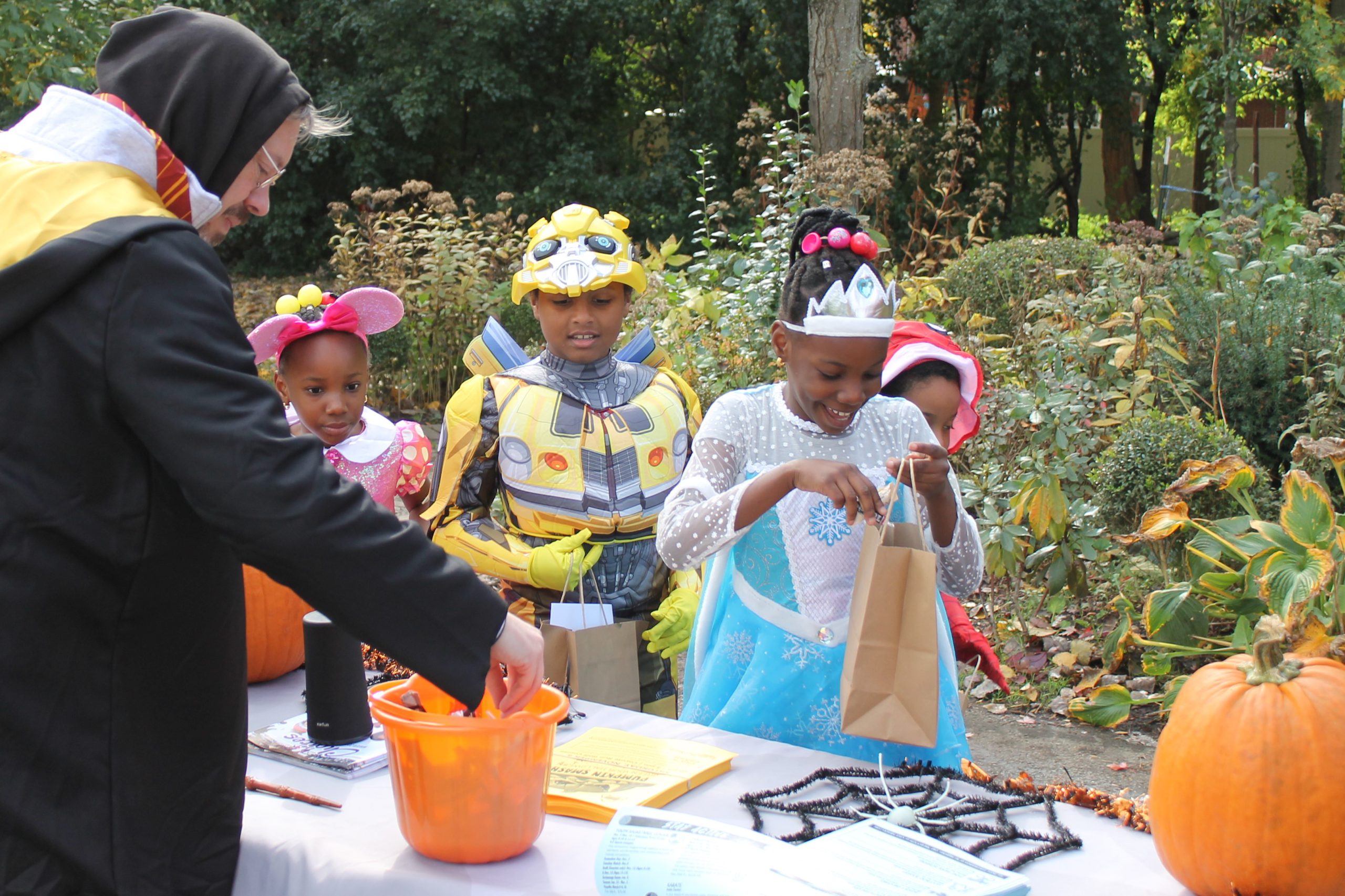 Photo of trick-or-treaters at the Trick or Treat Trail event.