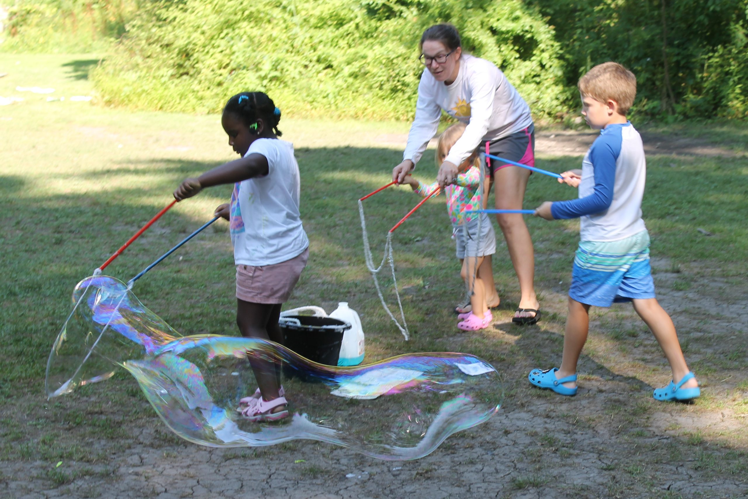 photo of participants making large bubbles