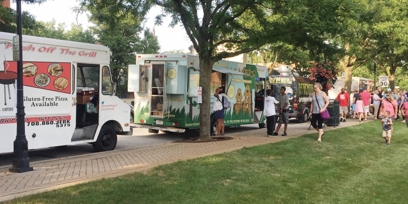 foodtrucks for banner photo of food trucks at an event.