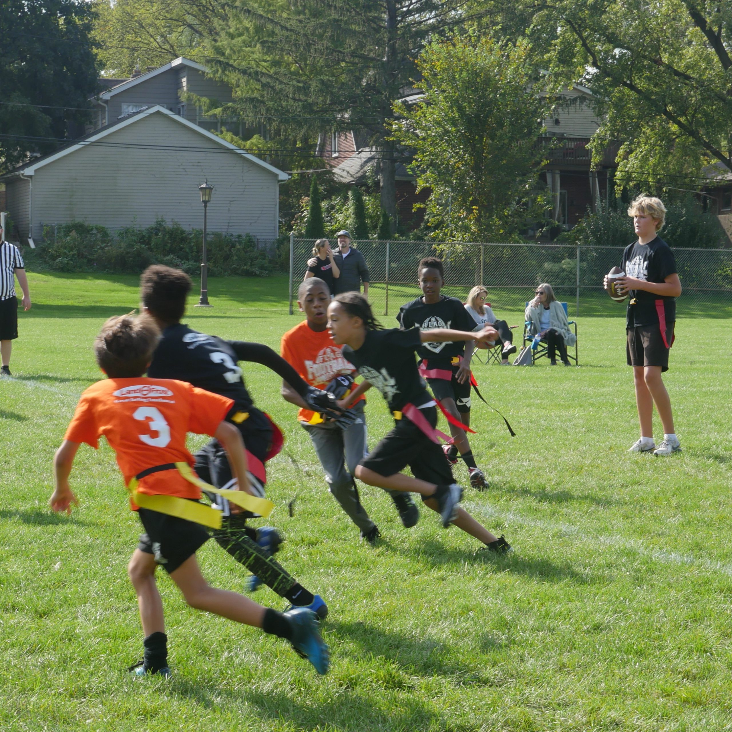 P1050588 photo of kids playing flag football