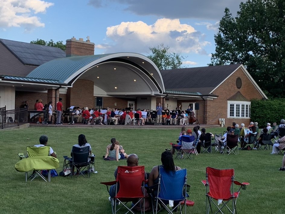 photo of group listening to a community band conert at irwin park