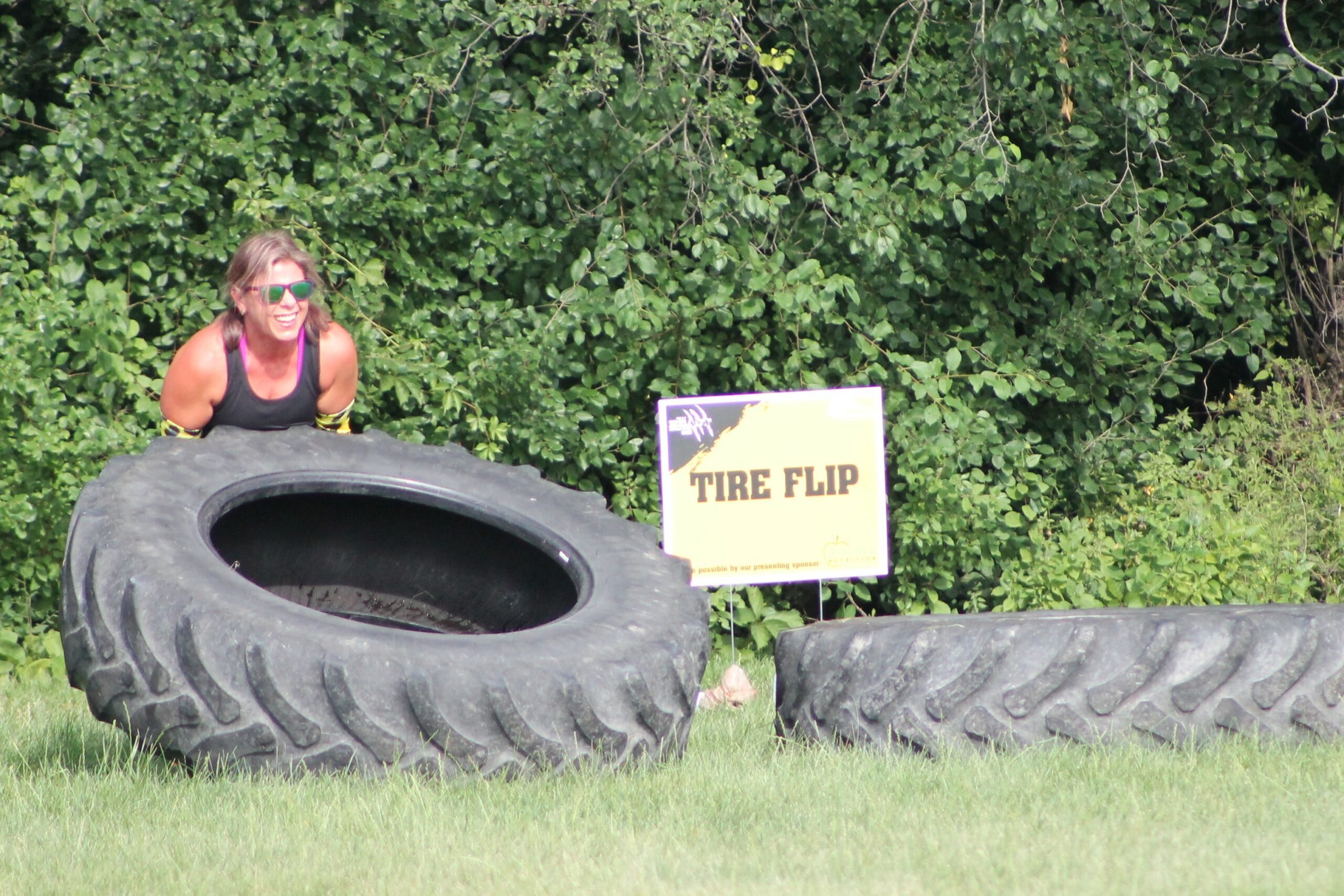 photo of a particpating liftina tire at the h f beast obstacle course dash